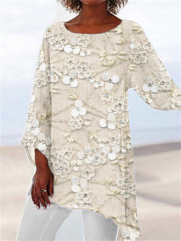 Women's floral embroidered asymmetrical tunic top, long sleeve. Chic, relaxed fit for spring/autumn fashion.