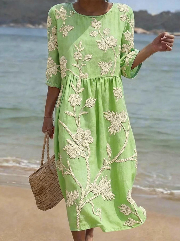 Stylish women's embroidered maxi dress with a flowing fit & round neck. Ideal for spring fashion & casual wear.