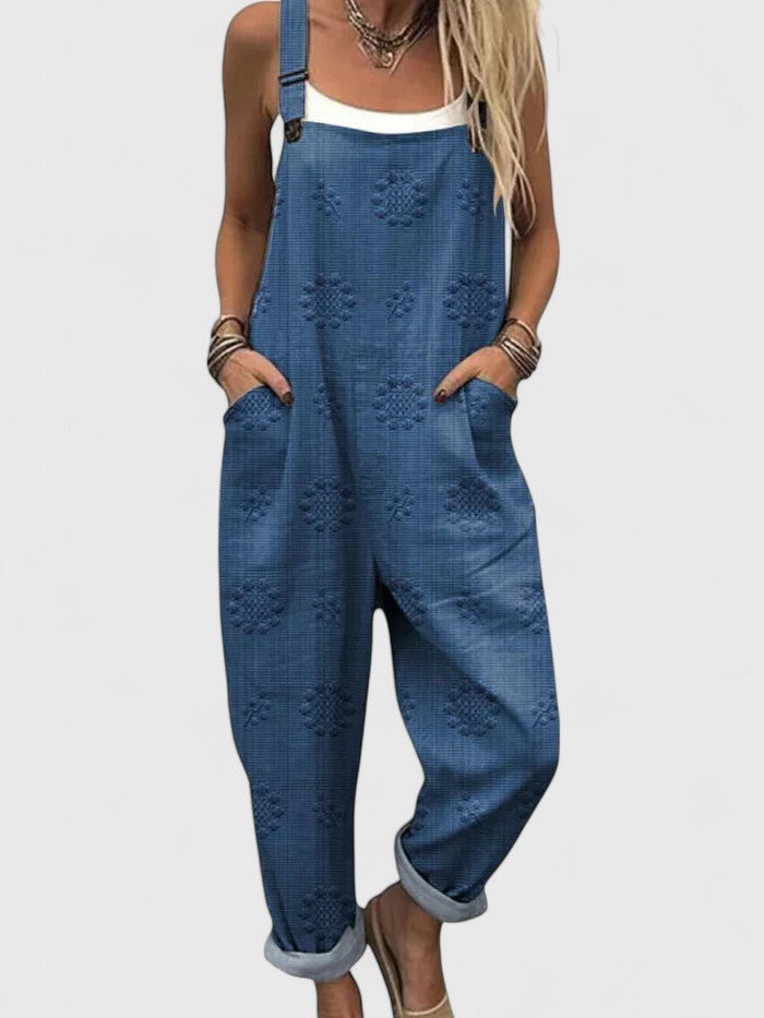 Women's floral embroidered loose fit jumpsuit with pockets. Perfect for casual spring/summer bohemian style.