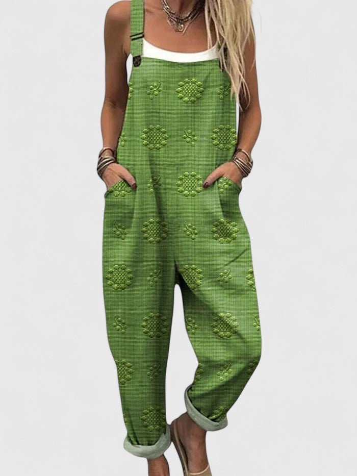 Relaxed fit women's jumpsuit featuring elegant floral embroidery. Comfortable casual wear for spring & summer.