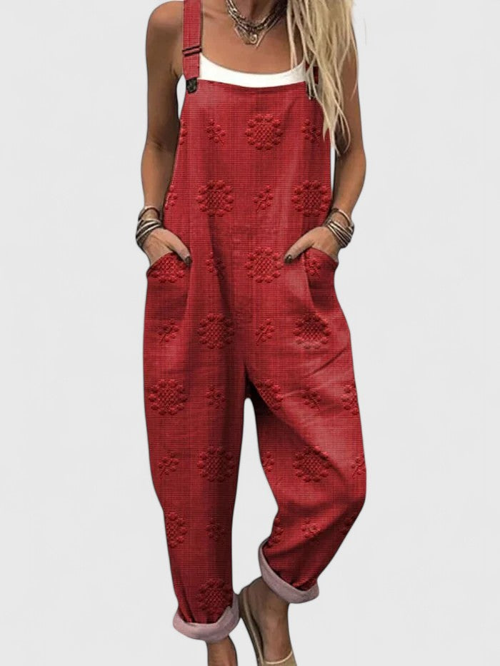 Bohemian style women's jumpsuit with adjustable straps & intricate floral embroidery. Ideal for summer comfort.