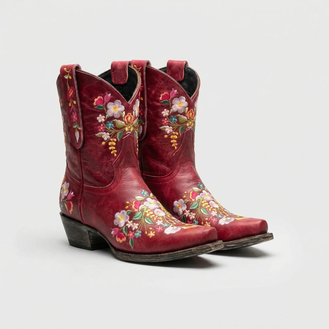 Lisa women's western ankle boots with vibrant floral embroidery, pointed toe & block heel for comfort.