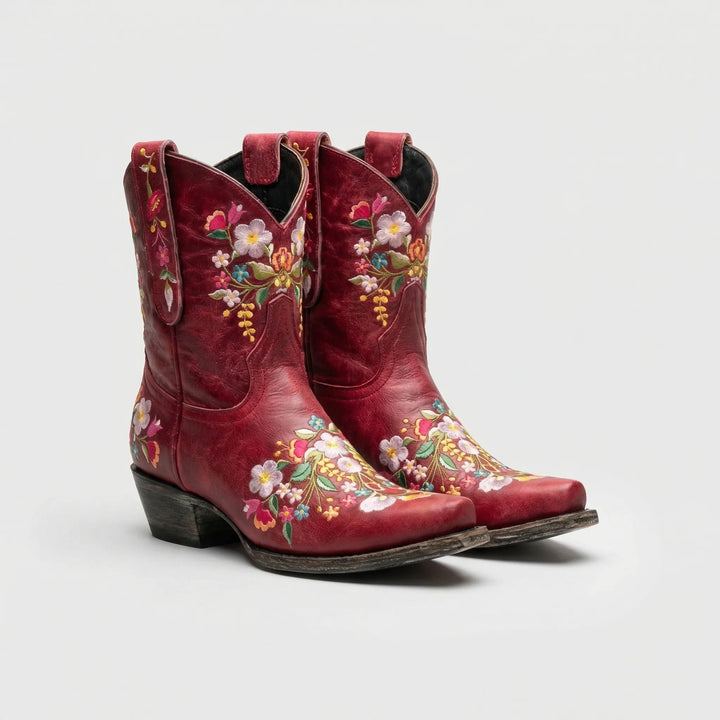 Lisa women's western ankle boots with vibrant floral embroidery, pointed toe & block heel for comfort.