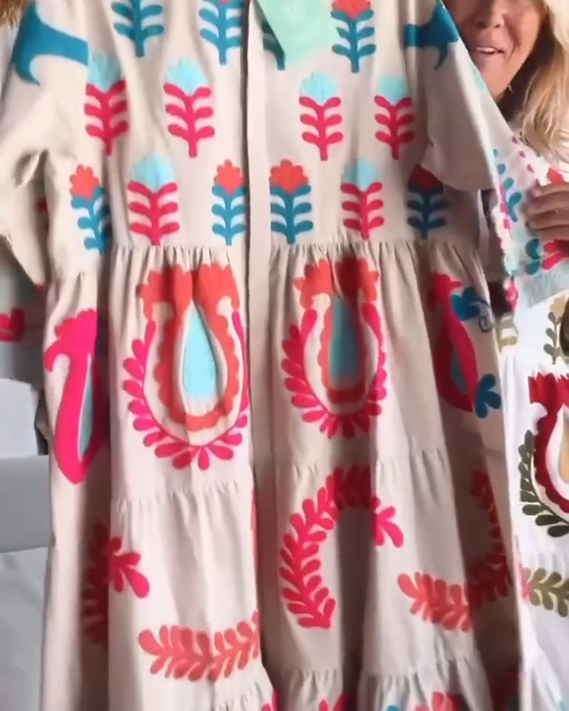 Versatile women's floral graphic midi dress with lapel collar, suitable for casual or vacation style.