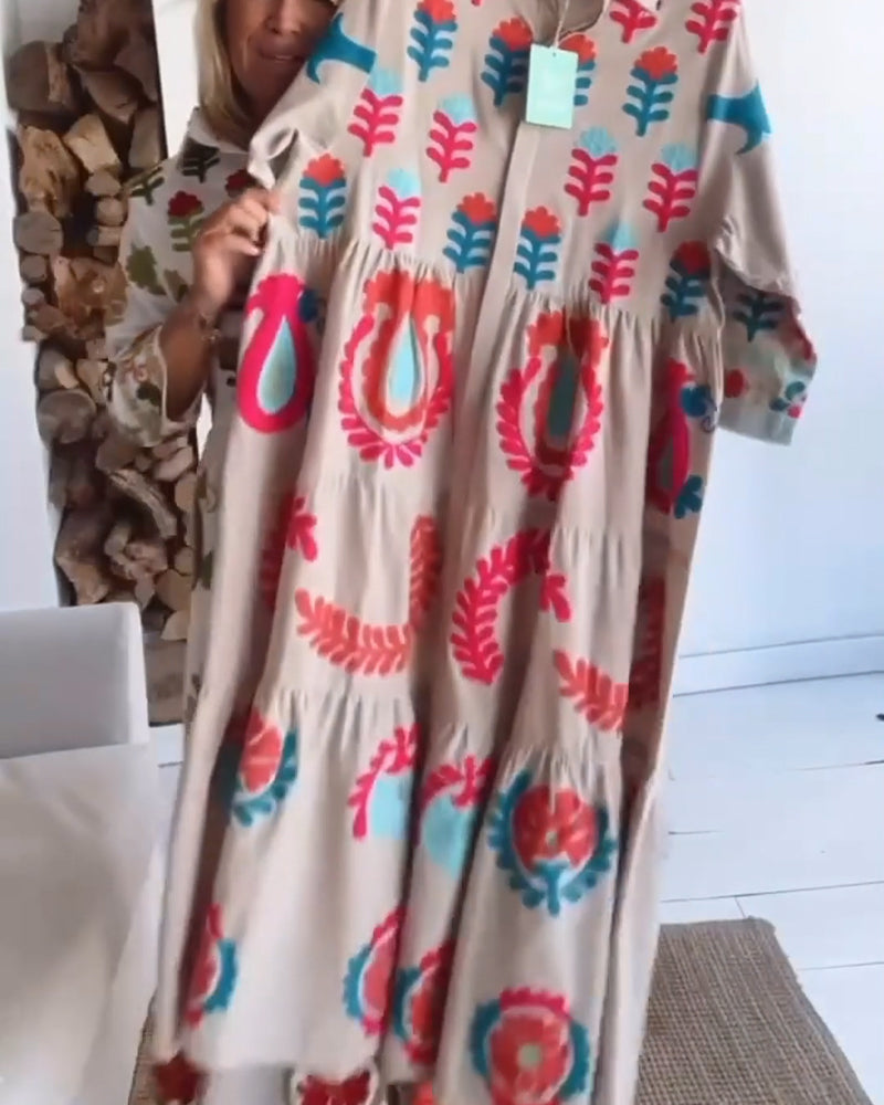 Women's midi dress featuring a unique floral graphic print, A-line cut, and a smart lapel collar.