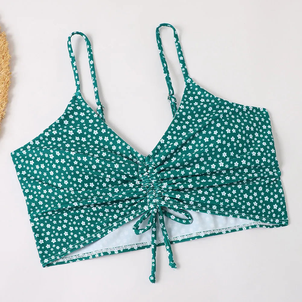 Supportive floral bikini top paired with high-waist bottoms, chic women's swimwear.