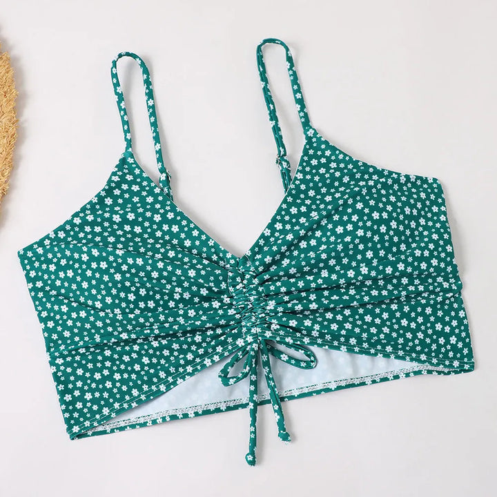 Supportive floral bikini top paired with high-waist bottoms, chic women's swimwear.