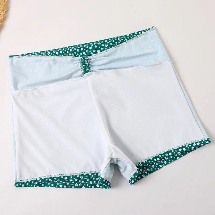 Retro floral high-waist bikini set, supportive women's swimwear for classic summer style.