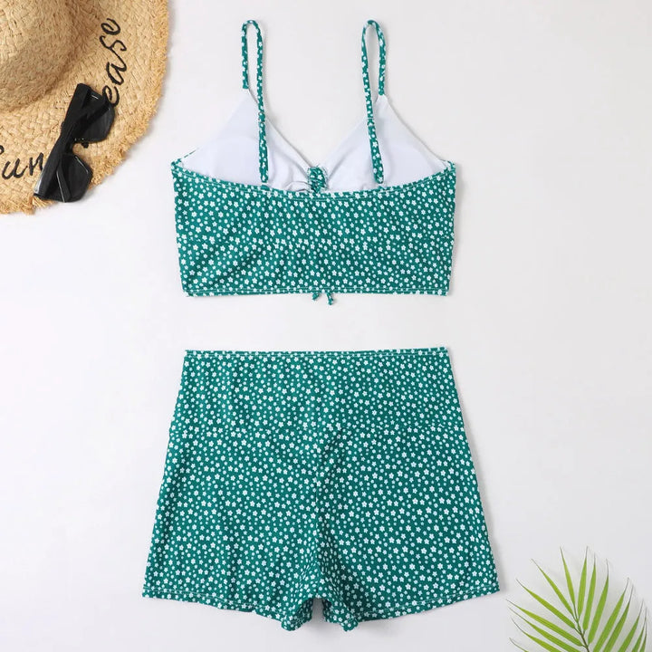 Trendy floral high-waist bikini set, women's fashion swimwear for a chic summer vacation.