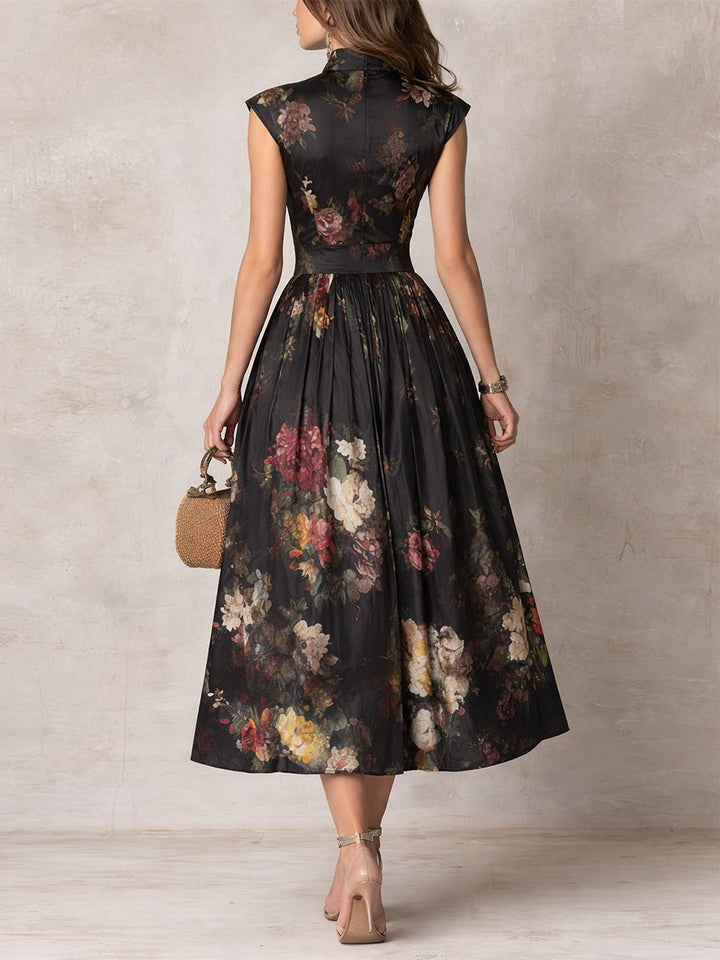 Chic floral midi dress with keyhole neckline and mandarin collar, ideal as a wedding guest or cocktail dress.