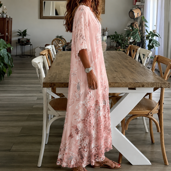 Pink floral maxi dress for women featuring a split neck and half sleeves, a flowy summer casual dress.