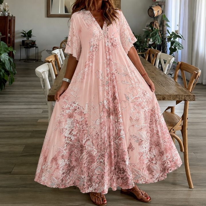 Elegant women's floral maxi dress with split neck, half sleeves. Versatile for summer outings & garden parties.