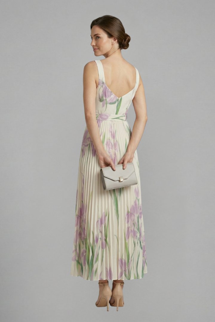 Lightweight floral maxi dress for women, square neck & pleated skirt, ideal for summer evenings.