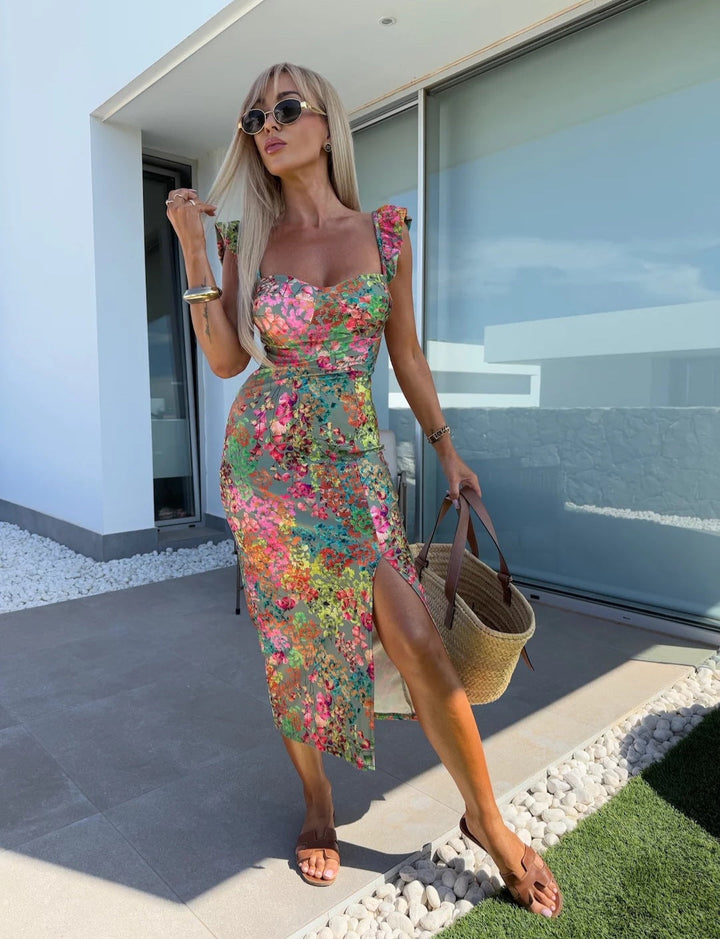 Women's floral midi summer dress with elegant side slit, perfect for casual wear or vacation.