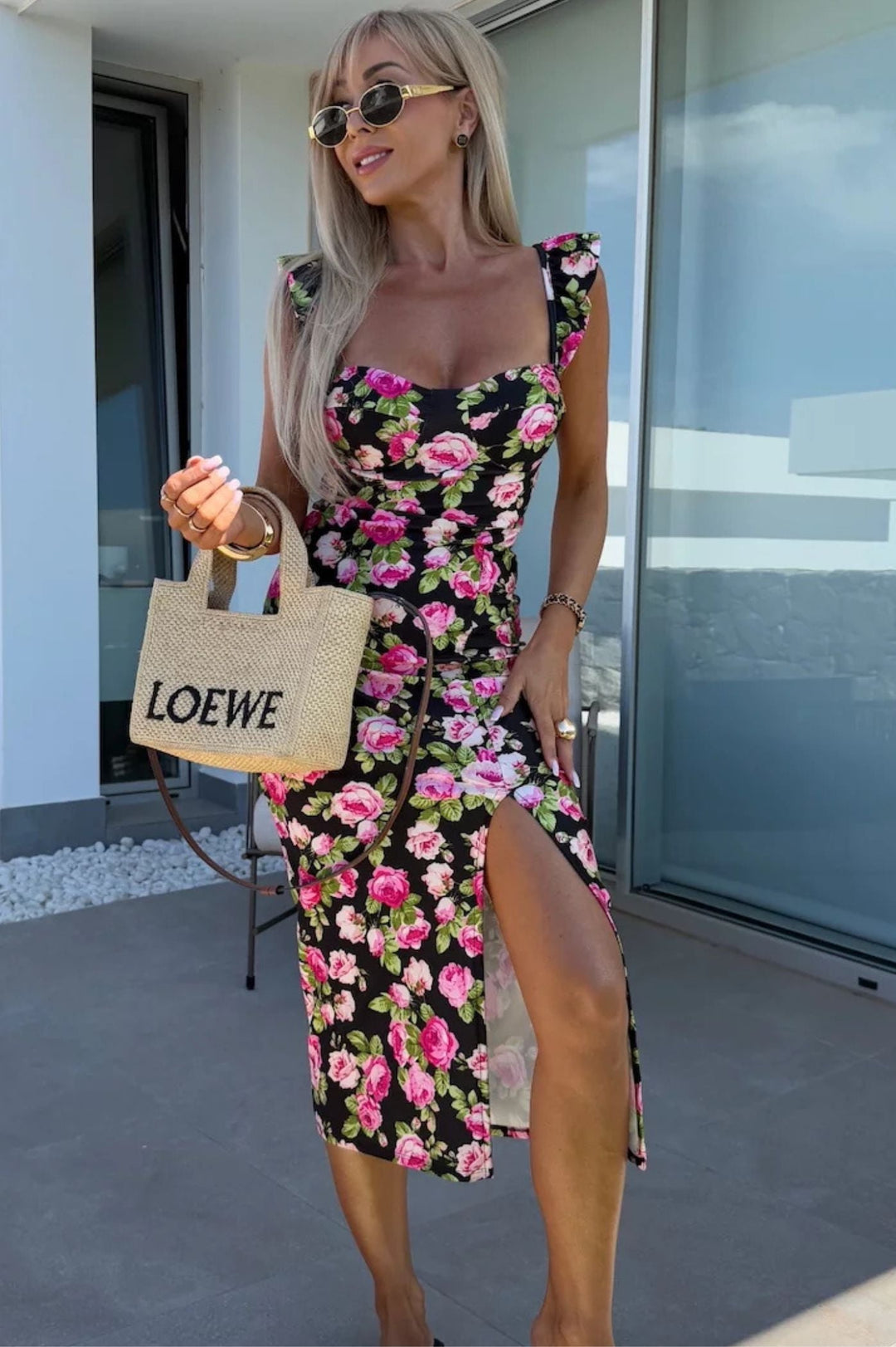 Lightweight floral midi summer dress for women, ideal as a casual or vacation outfit with side slit.