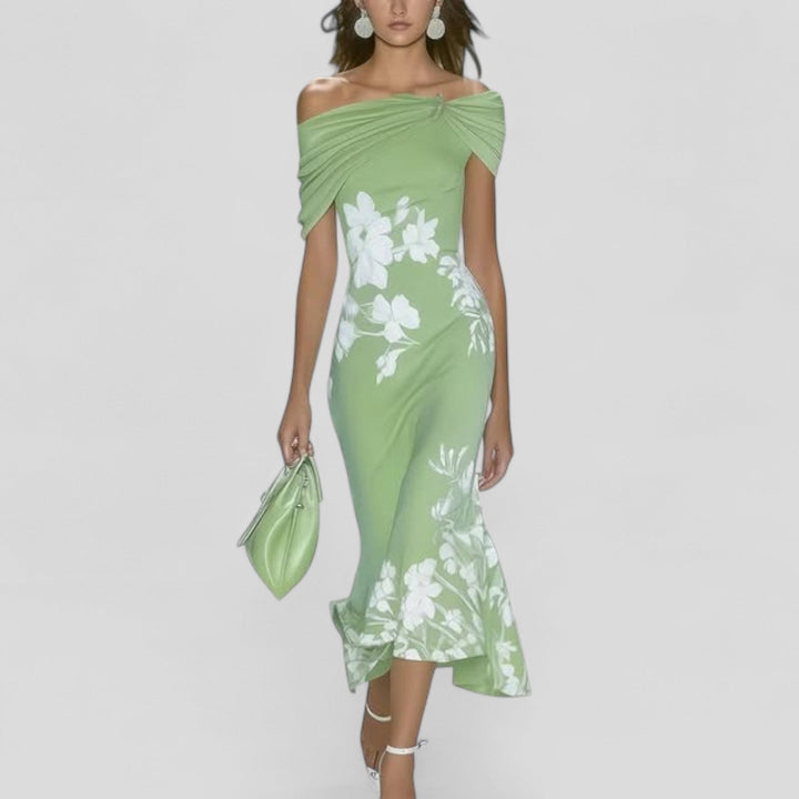 Women's floral off-shoulder bodycon midi dress, perfect for wedding guests or elegant party wear, with a stylish fishtail hem.