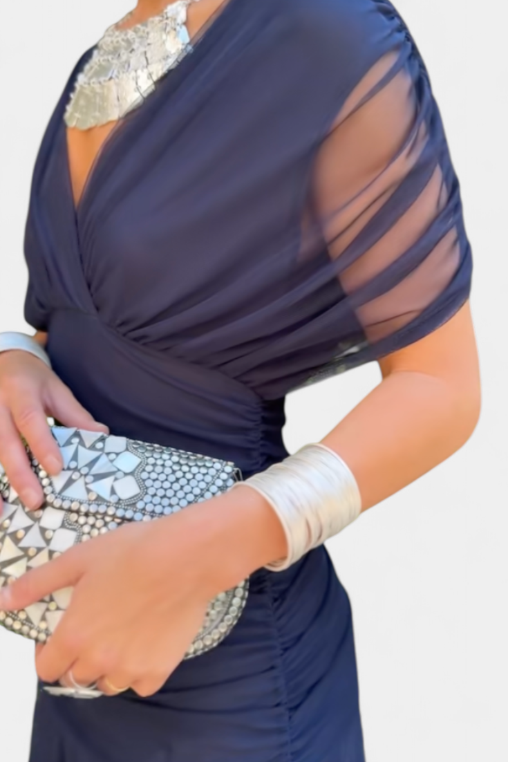 Elegant ruched floral maxi dress with off-shoulder & long sleeves. Women's ceremony & evening wear.