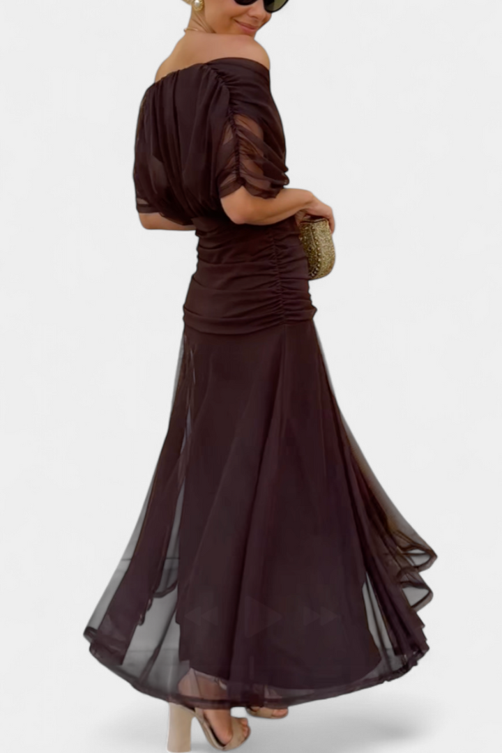 Women's long sleeve off-shoulder floral maxi dress. Elegant and flattering formal gown for ceremonies.
