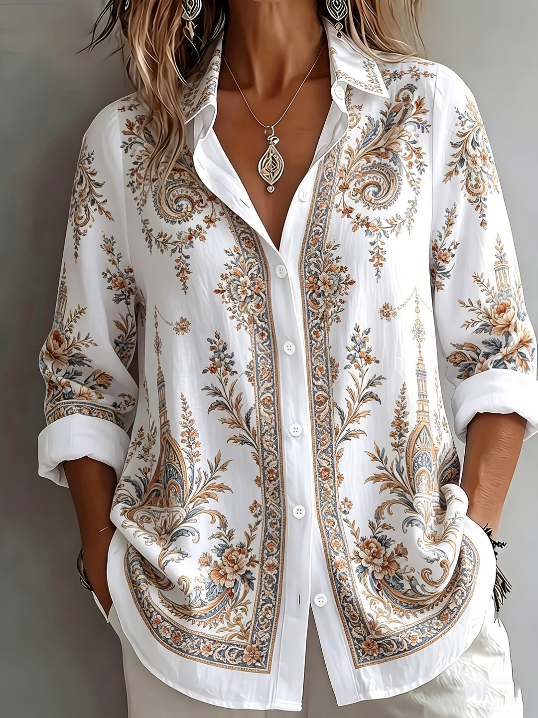Autumn women's floral paisley print long sleeve oversized blouse with a flowy fit.