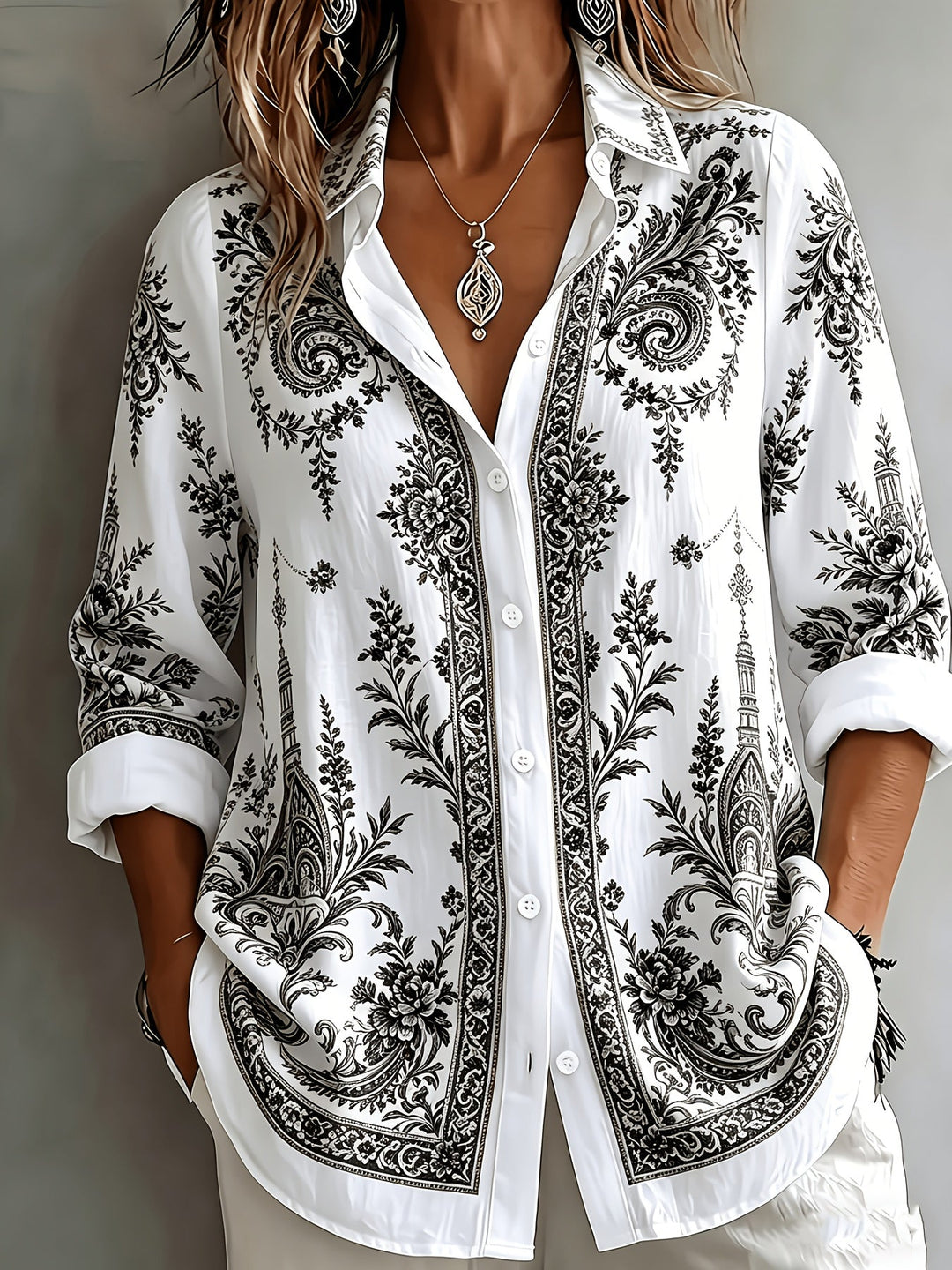 Boho style women's floral paisley print long sleeve oversized top, relaxed fit.