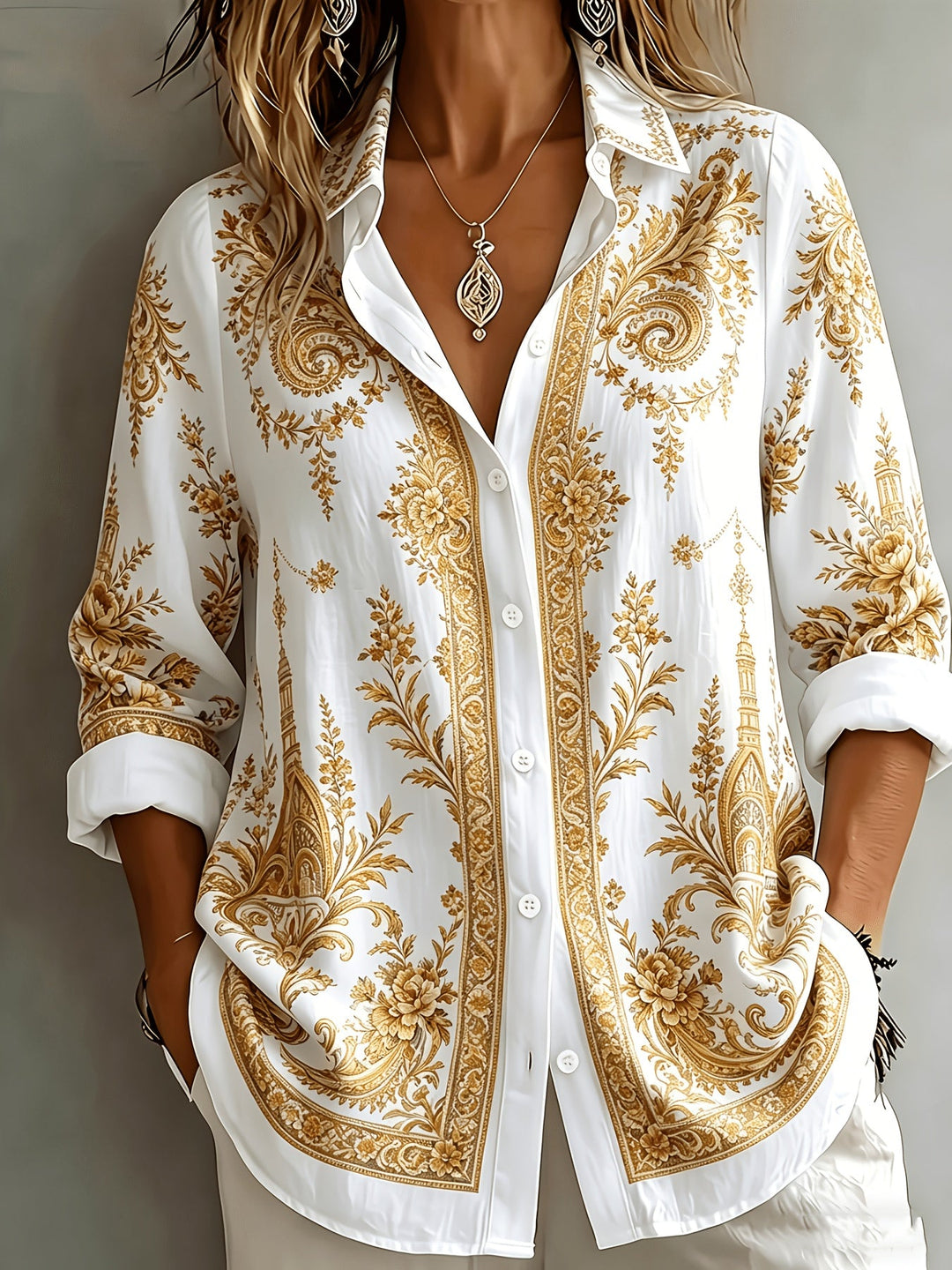Casual women's button-down floral paisley print long sleeve oversized blouse.