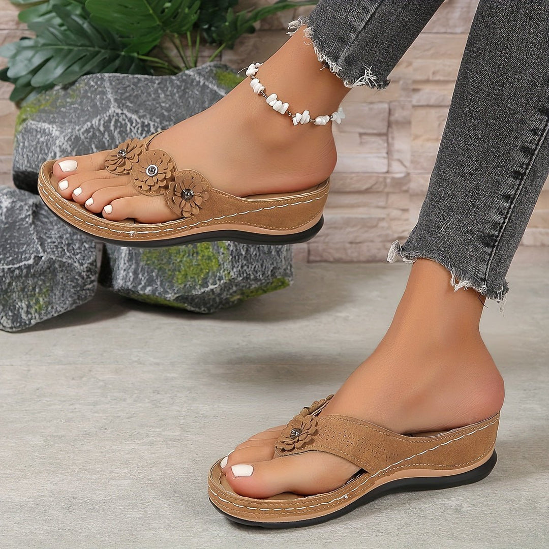 Elegant women's floral wedge sandals with platform. Comfortable summer slip-on fashion.