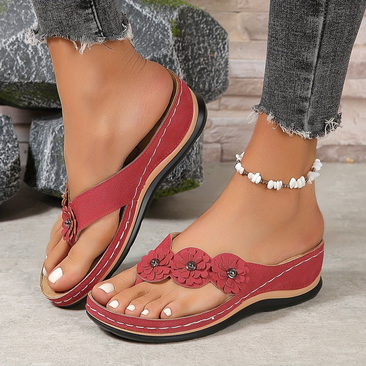 Elegant women's open-toe floral platform wedge sandals. Ideal for casual summer comfort.