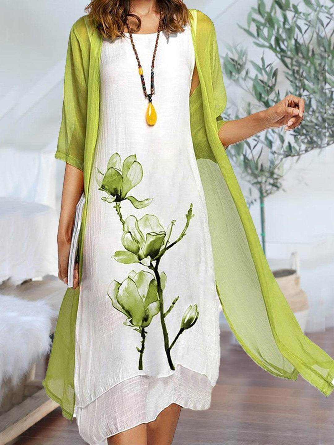 Women's floral print 2-piece midi dress set with elegant sheer cardigan overlay. Perfect for spring & summer.