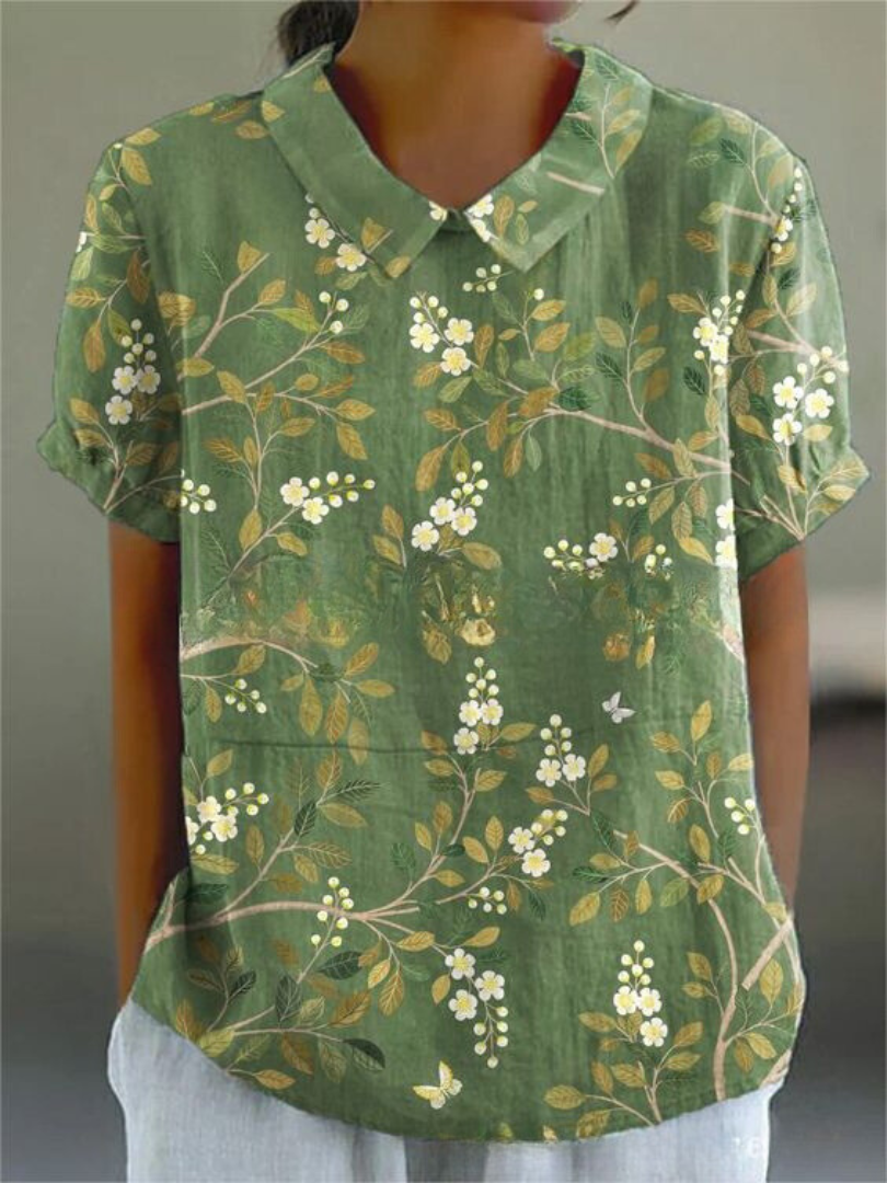 Comfortable women's floral print collared blouse, short sleeve, perfect for relaxed casual summer outfits.