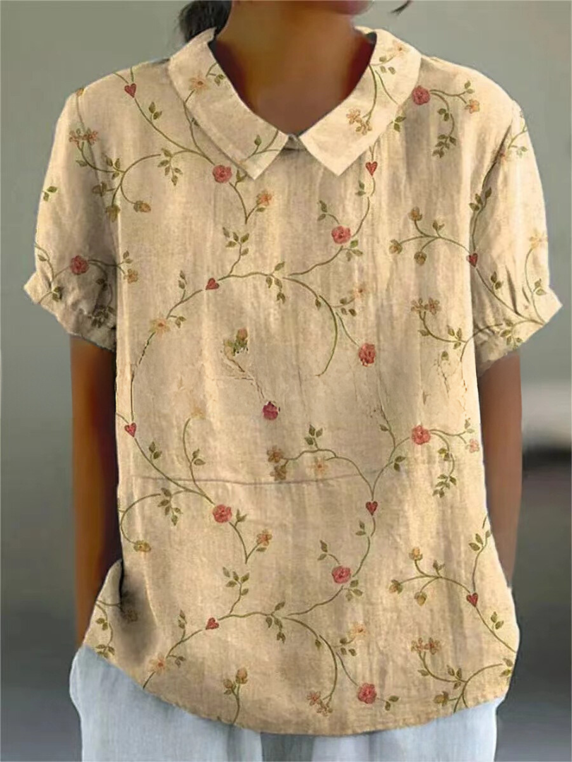Chic women's short sleeve floral print collared blouse. A fashionable and versatile top for summer & casual outings.