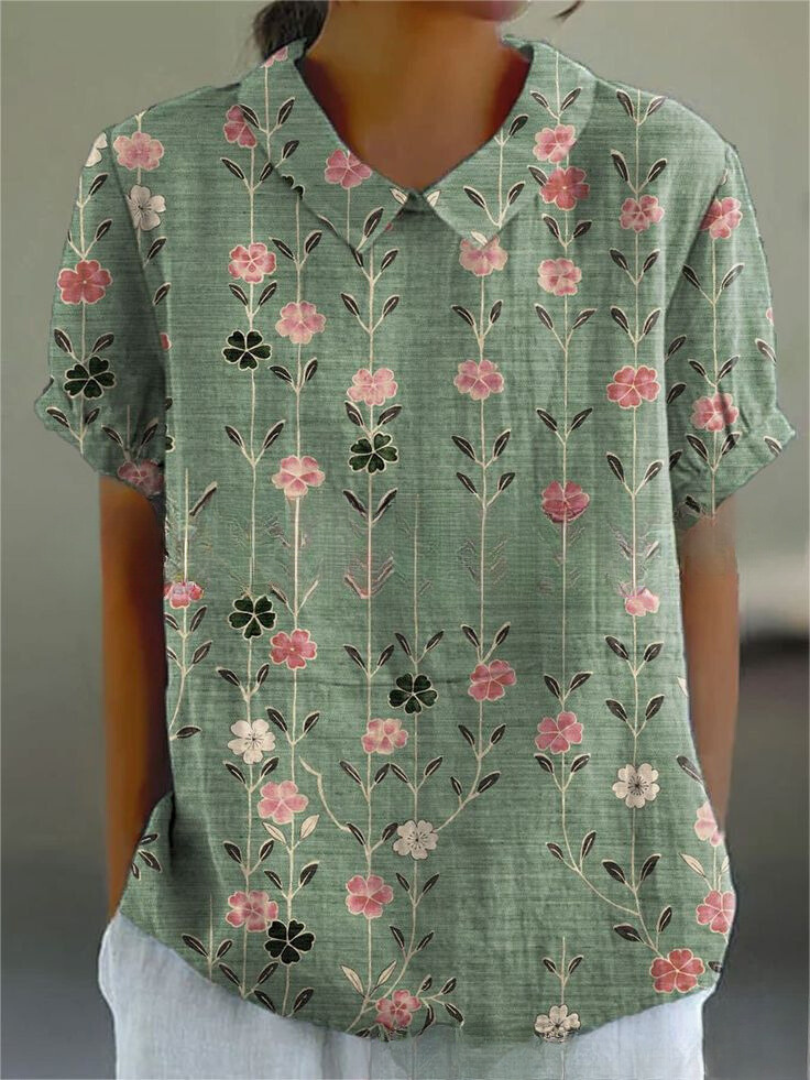 Relaxed fit women's floral print short sleeve collared blouse, perfect for stylish everyday summer casual fashion.