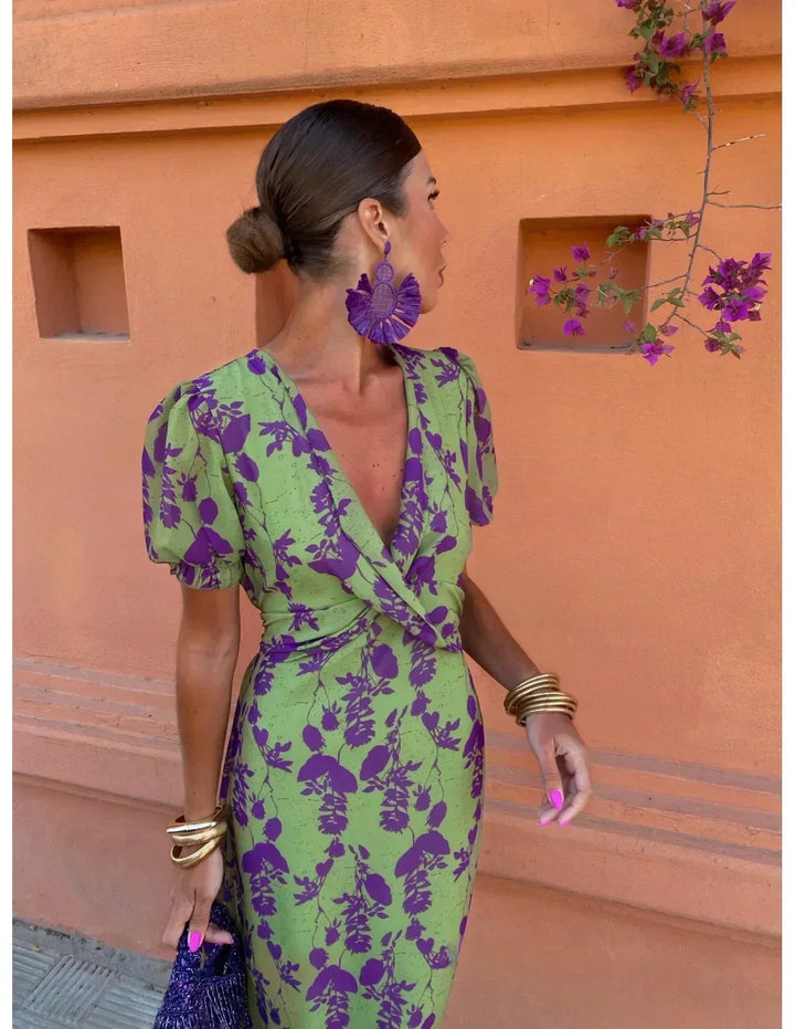 Stylish women's floral print maxi dress with a flattering wrap V-neck, great for casual or elegant events.