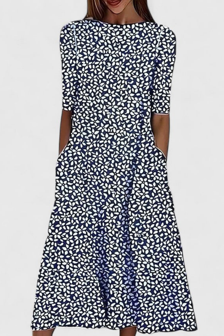 Casual women's floral midi dress, A-line cut with convenient pockets. Short sleeve, perfect for warm weather.