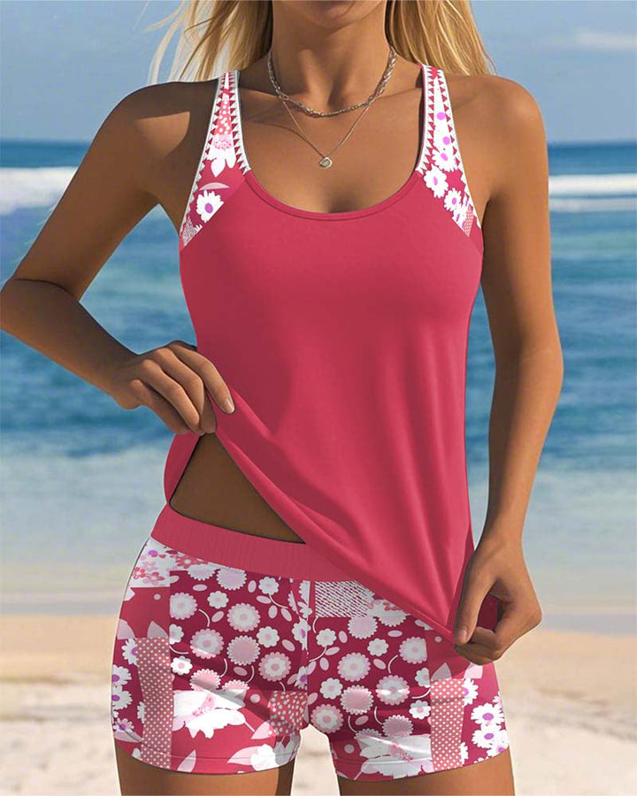 Women's floral print racerback tankini top and boyshort set. Stylish and modest swimwear for summer.