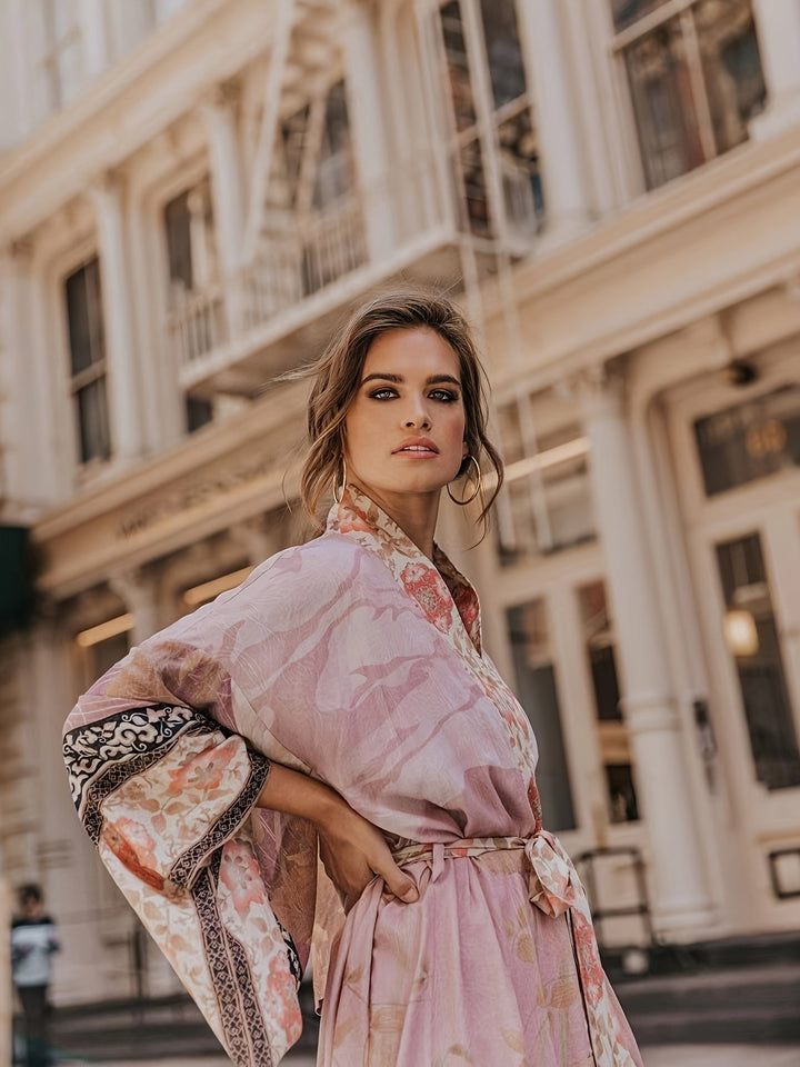 Airy women's floral print kimono. Lightweight, open-front beach cover-up for comfortable summer resort style.