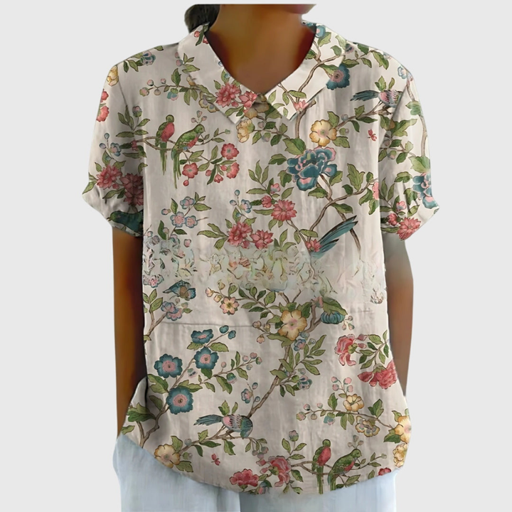 Chic women's floral print short sleeve blouse with a sophisticated collar for a stylish look.