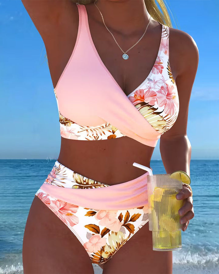 Women's floral print split bikini set, perfect for stylish beach days & summer fashion.
