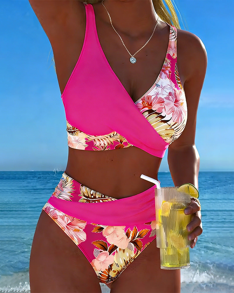 Vibrant two-piece women's floral bikini set, perfect for beach trips and poolside fun.