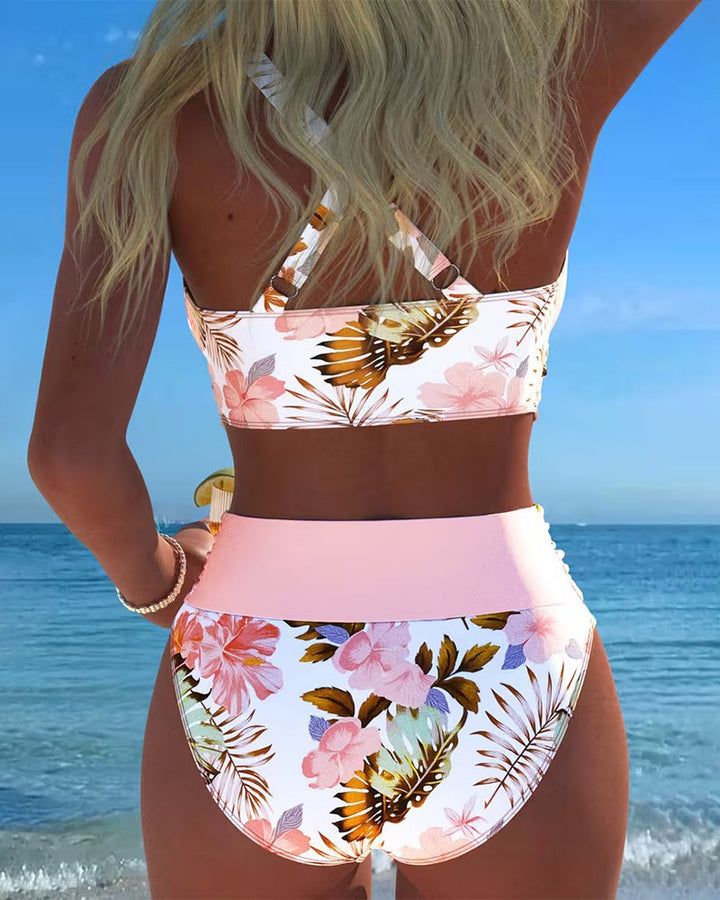 Two-piece women's floral print swimsuit, ideal beachwear for your tropical vacation.