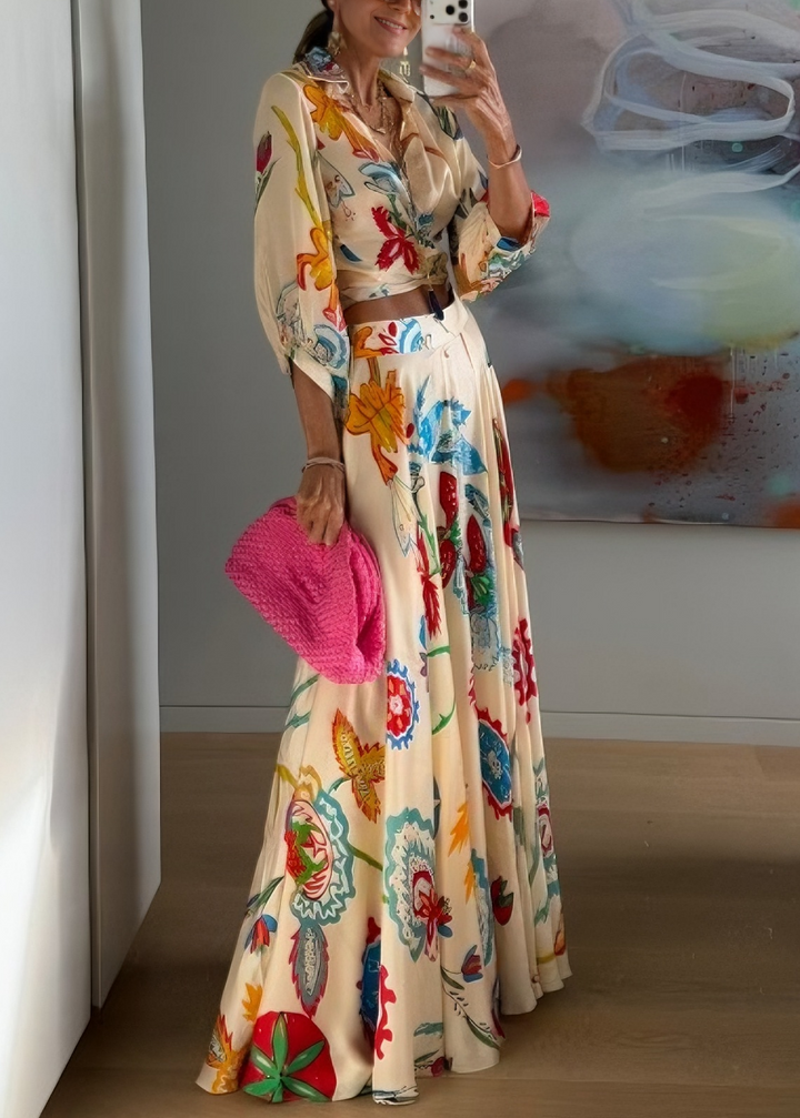 Flowy floral print women's tie-front top & maxi skirt set, comfortable resort and vacation wear.