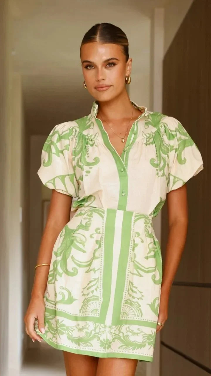 Vibrant floral puff sleeve mini dress for women. A chic choice for special events.