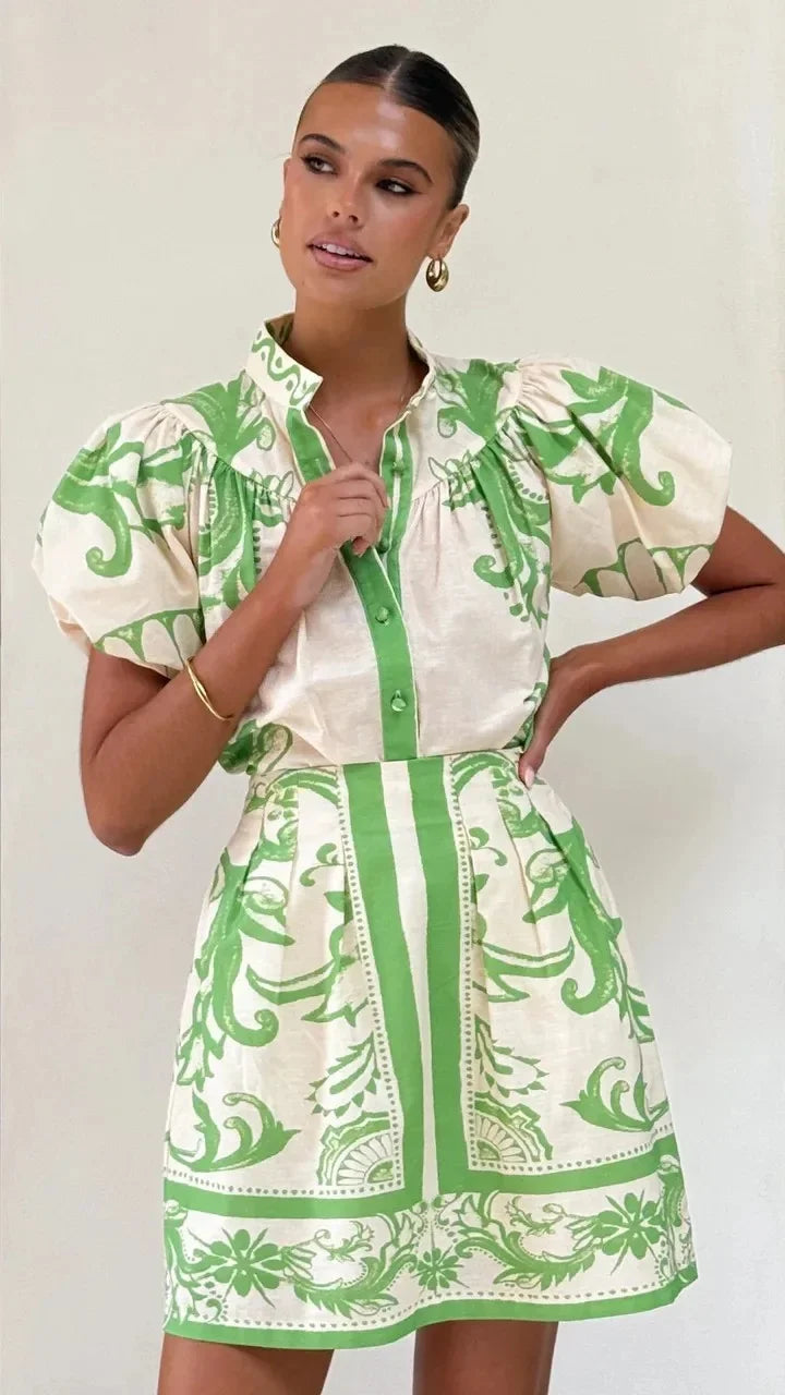 Elegant women's cocktail mini dress, floral print & puff sleeves. Perfect for date night.