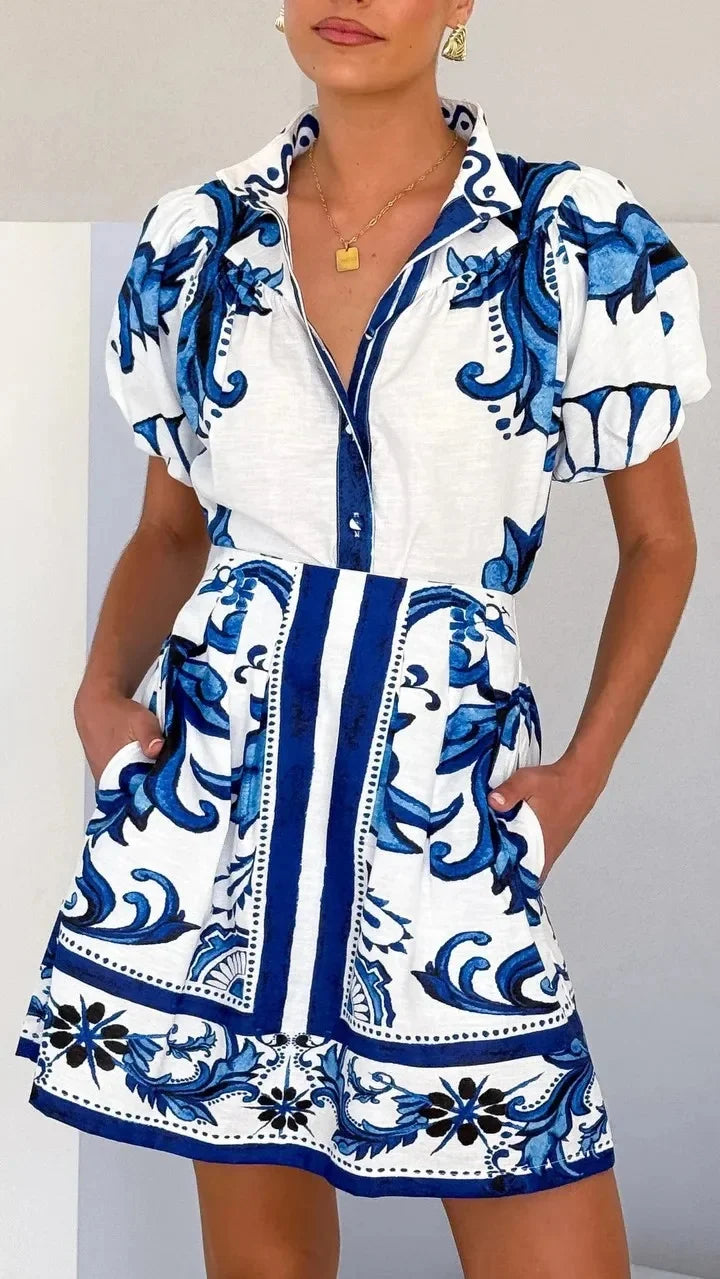 Women's floral puff sleeve mini dress. Stylish event wear for special occasions.