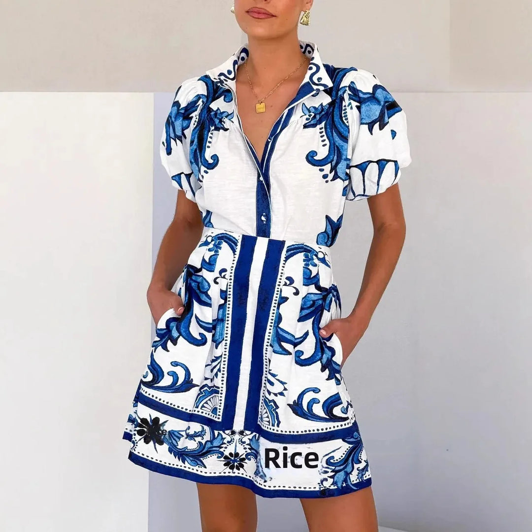 Elegant women's mini dress with floral print & puff sleeves. Great for cocktail events.