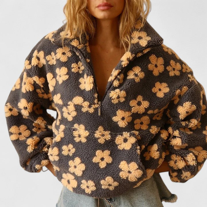 Women's floral quarter-zip pullover sweater, cozy relaxed fit for fall & winter layering.