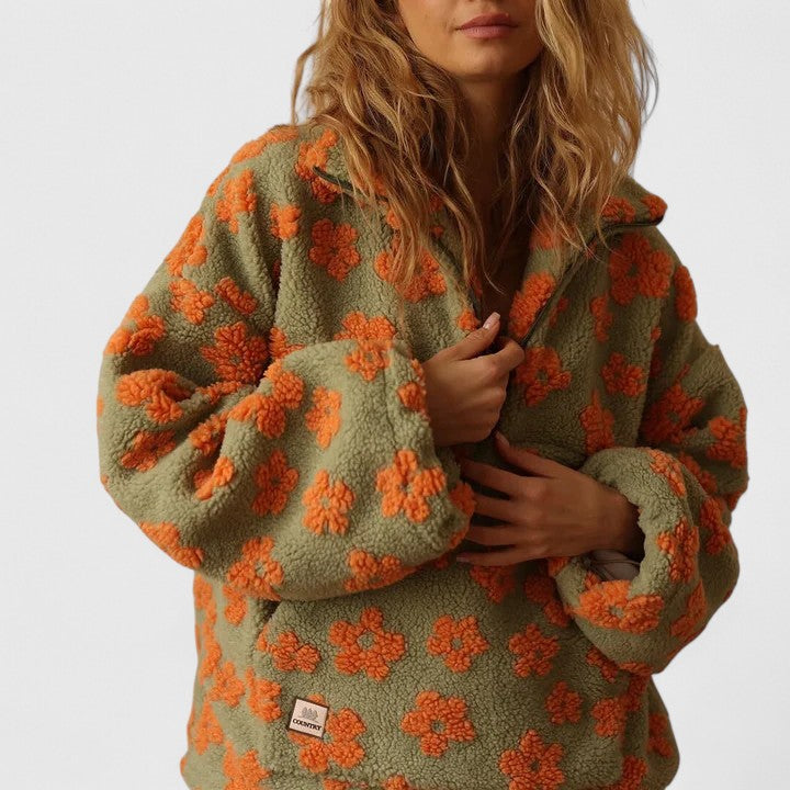 Beautiful floral print women's quarter-zip pullover sweater. Cozy, comfortable, and stylish for any season.