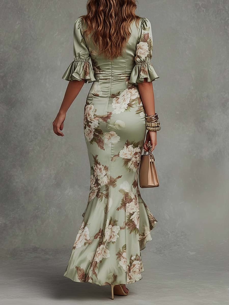Stunning floral ruched fishtail maxi dress for women, a beautiful evening gown or formal wedding guest attire.