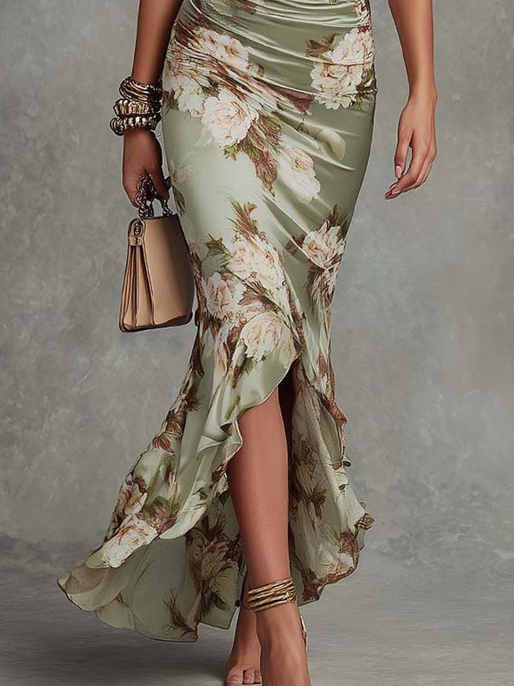 Women's elegant floral ruched fishtail maxi dress with a v-neck & frill sleeves, perfect for weddings & parties.
