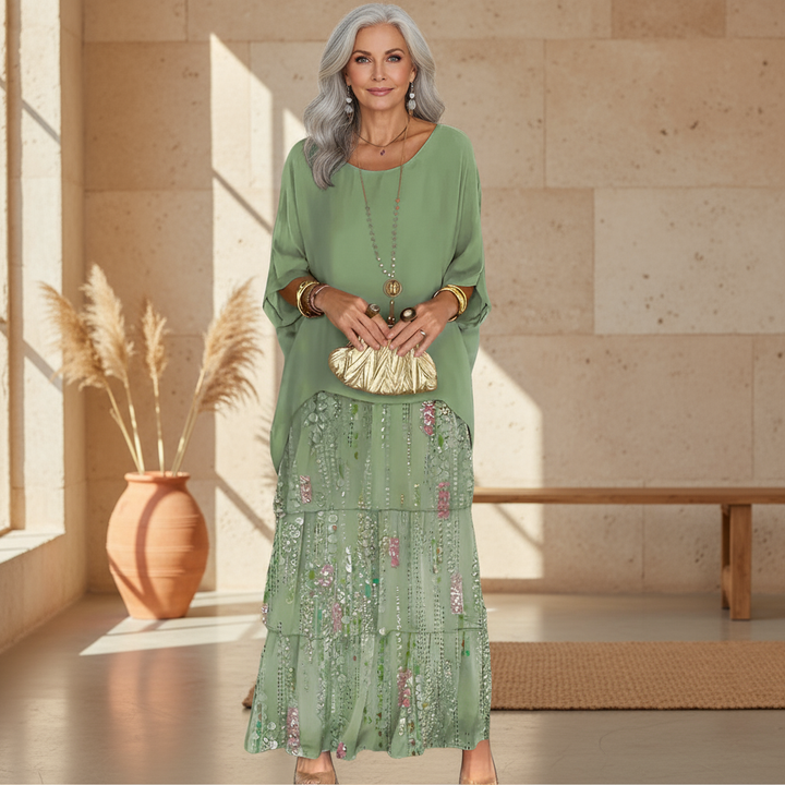 Women's floral sequin tiered boho maxi dress, perfect for wedding guests & summer parties. Elegant occasion wear.