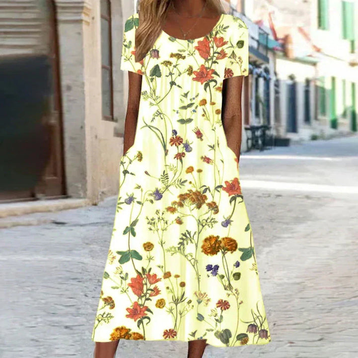 Elegant women's floral print short sleeve midi dress, a comfortable and stylish choice for spring and summer fashion.